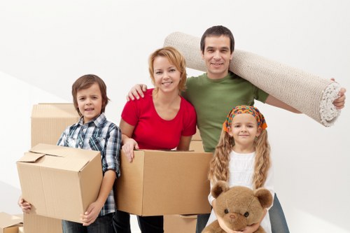 Moving team handling furniture safely during removals in Enfieldtown